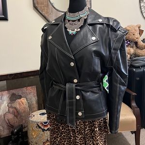 A step closer to the goal wearing a strong, yet soft faux leather jacket!